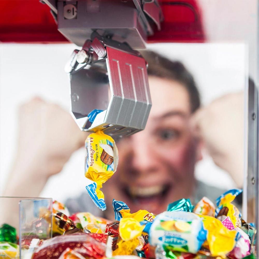 Грабнете автомат за бонбони или играчка за грабване на сладки или бонбони